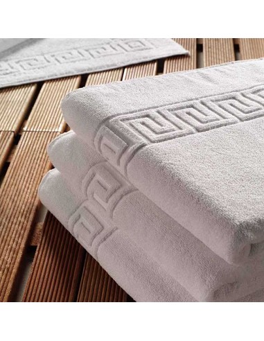Toalla Blanca de Hotel Cenefa Greca...